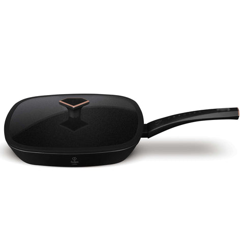 Product image of Grill pan with lid 28cm. Part of the MATTE BLACK- ROSE GOLD . Features: • Material: forged aluminum with non-stick titanPro coating • Grill pan with lid Ø28*4,1 cm 2,1L • Color: matt black- rose gold. (Studio view). Official Berlinger Haus product, boosted by Promintra sl.