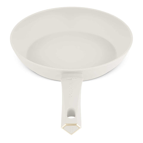 Product image of Frypan 28cm. Part of the MATTE CREAM- GOLD . Features: • Material: forged aluminum with non-stick titanPro coating • Frypan Ø28*5,2 cm 2,4L • Color: matt cream- gold. (Studio view). Official Berlinger Haus product, boosted by Promintra sl.