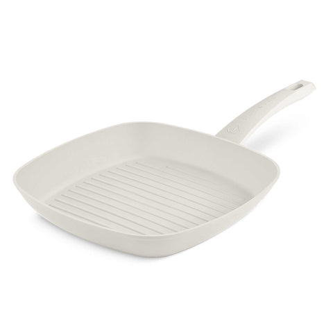 Product image of Grill pan 28cm. Part of the MATTE CREAM- GOLD . Features: • Material: forged aluminum with non-stick titanPro coating • Grill pan Ø28*4,1 cm 2,1L • Color: matt cream- gold. (Studio view). Official Berlinger Haus product, boosted by Promintra sl.