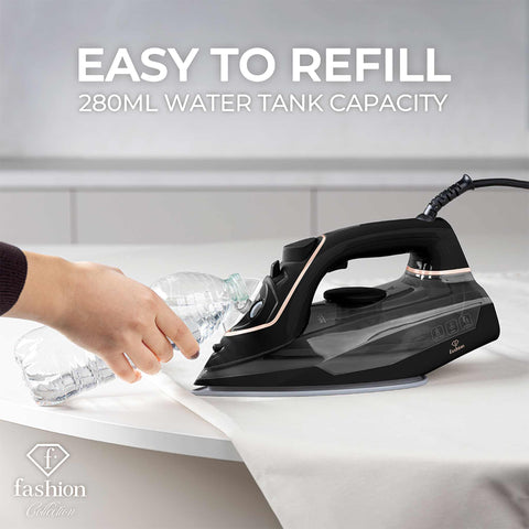 Product image of Iron. Part of the MATTE BLACK- ROSE GOLD . Features: • 220-240V, 50/60Hz, 2400 W • Functions: Dry/Steam/Vertical steam/Burst/Spray/Self clean/Anti scale/Anti drip • Water tank capacity: 280 ml • Lengt.... (Studio view). Official Berlinger Haus product, boosted by Promintra sl.