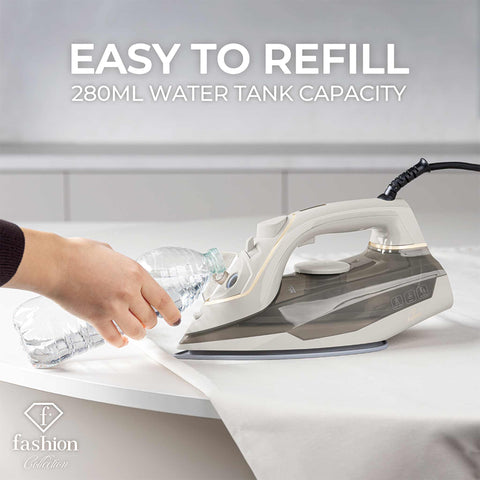 Product image of Iron. Part of the MATTE CREAM- GOLD . Features: • 220-240V, 50/60Hz, 2400 W • Functions: Dry/Steam/Vertical steam/Burst/Spray/Self clean/Anti scale/Anti drip • Water tank capacity: 280 ml • Lengt.... (Studio view). Official Berlinger Haus product, boosted by Promintra sl.
