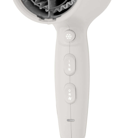 Product image of Professional hair dryer. Part of the MATTE CREAM- GOLD . Features: • 220-240V, 50-60 Hz, 1950-2300W • DC motor • Accessories: • Nozzle • Diffuser • Length of power cord: 1,8 m • Color: cream- gold. (Studio view). Official Berlinger Haus product, boosted by Promintra sl.