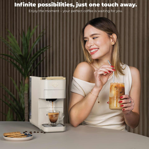 Product image of Capsule coffee maker 4in1. Part of the MATTE CREAM- GOLD . Features: • Voltage: 220-240V, 50/60Hz • Power: 1545W • 1,5L water tank • Detachable tray design • Accessories: • Nespresso small capsules holder • Dolce Gus.... (Studio view). Official Berlinger Haus product, boosted by Promintra sl.
