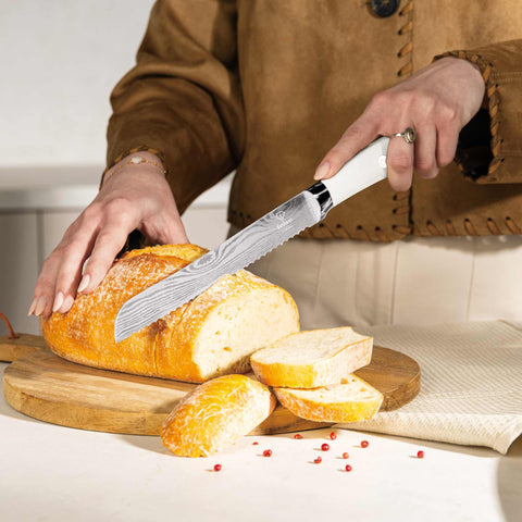 Product image of 6pcs knife set with stand. Part of the MATTE CREAM- GOLD . Features: • Material: stainless steel • Chef knife 20 cm • Bread knife 20 cm • Santoku knife 17,5 cm • Utility knife 12,5 cm • Paring knife 9 cm • Stand • Co.... (Studio view). Official Berlinger Haus product, boosted by Promintra sl.