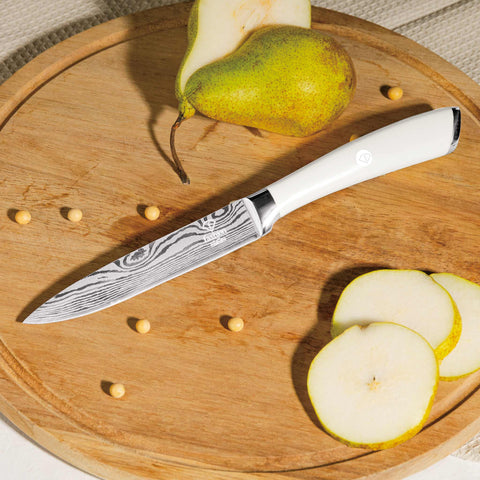 Product image of 6pcs knife set with stand. Part of the MATTE CREAM- GOLD . Features: • Material: stainless steel • Chef knife 20 cm • Bread knife 20 cm • Santoku knife 17,5 cm • Utility knife 12,5 cm • Paring knife 9 cm • Stand • Co.... (Studio view). Official Berlinger Haus product, boosted by Promintra sl.
