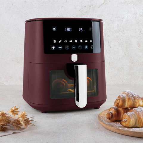 Product image of Air fryer 5L visible window. Part of the Leonardo Collection . Features: • Power: 220-240V ~ 1400W • Temperature control: 40-200℃ • Include: • XL SIZE: food basket with non-stick coating 5L • DIGITAL • Color: matt bordeaux. (Studio view). Official Berlinger Haus product, boosted by Promintra sl.