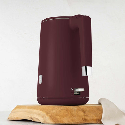 Product image of Double wall kettle. Part of the Leonardo Collection . Features: • Material: 18/10 stainless steel inside, plastic outside • Capacity: 1,7L • Voltage: 220-240V,50/60Hz • Power: 1800 W • Color: matt bordeaux. (Studio view). Official Berlinger Haus product, boosted by Promintra sl.